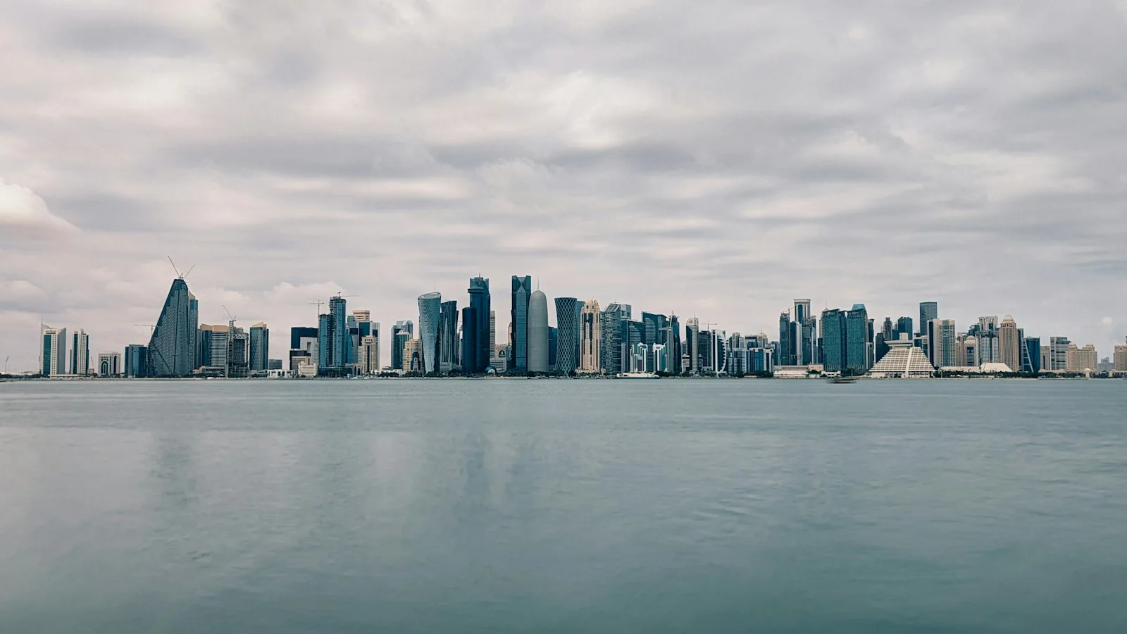 Doha West Bay business skyline viewed across the waterfront